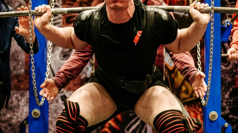Powerlifter using a low-bar squat