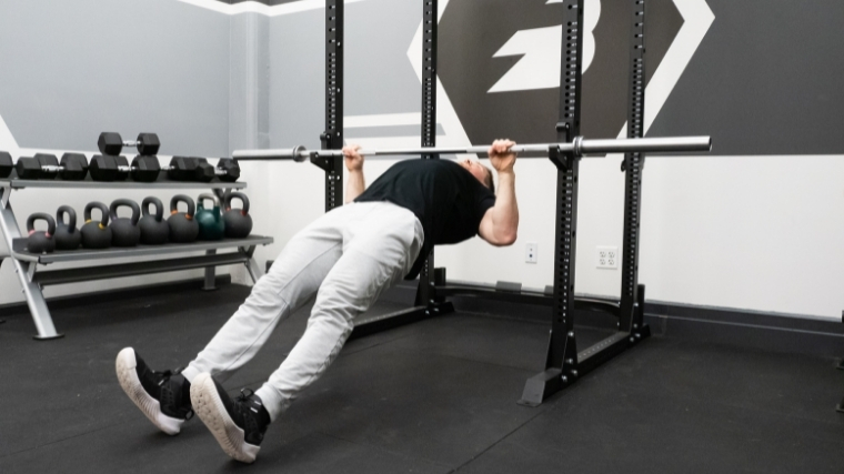 Man doing inverted row