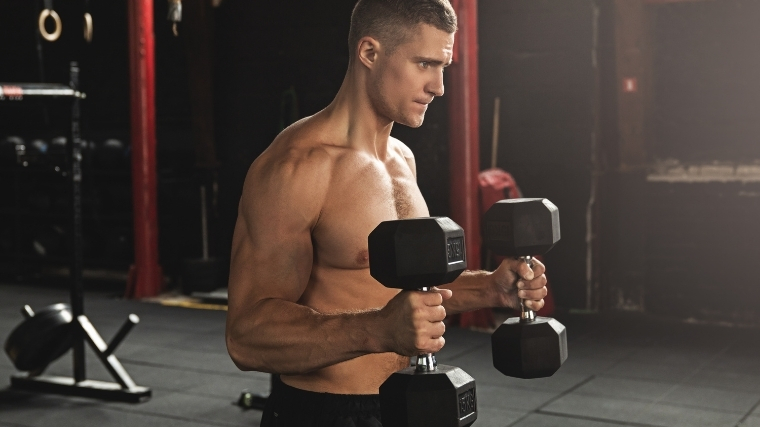 Man performing dumbbell hammer curl