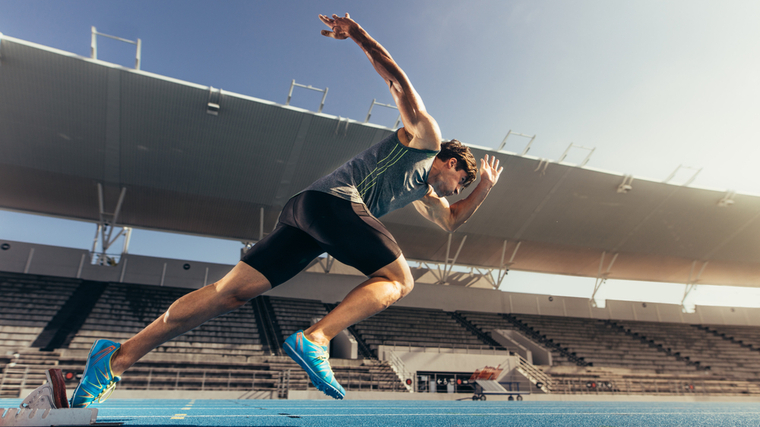 man sprinting on track 