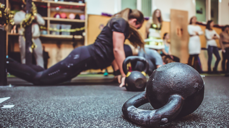 woman warming up for kettlebell training