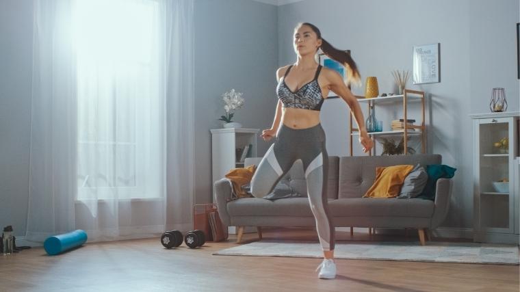 Woman working out in a living room