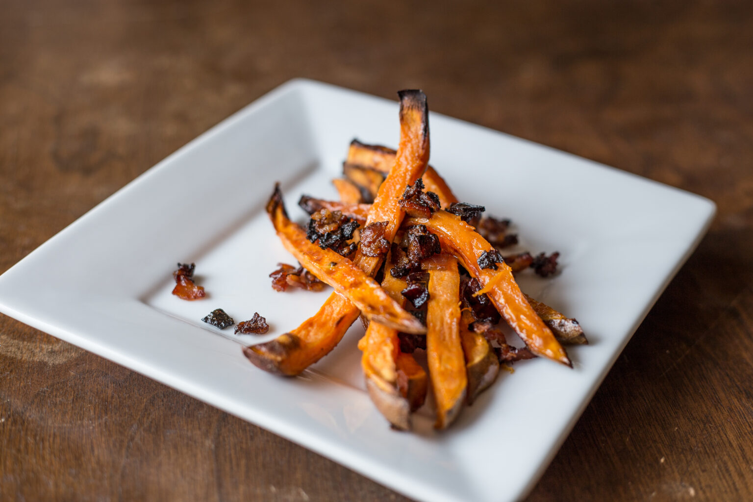 Give Your Carbs a Makeover with Maple Bacon Sweet Potato Fries BarBend