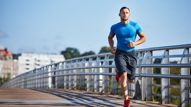 Man running on pier