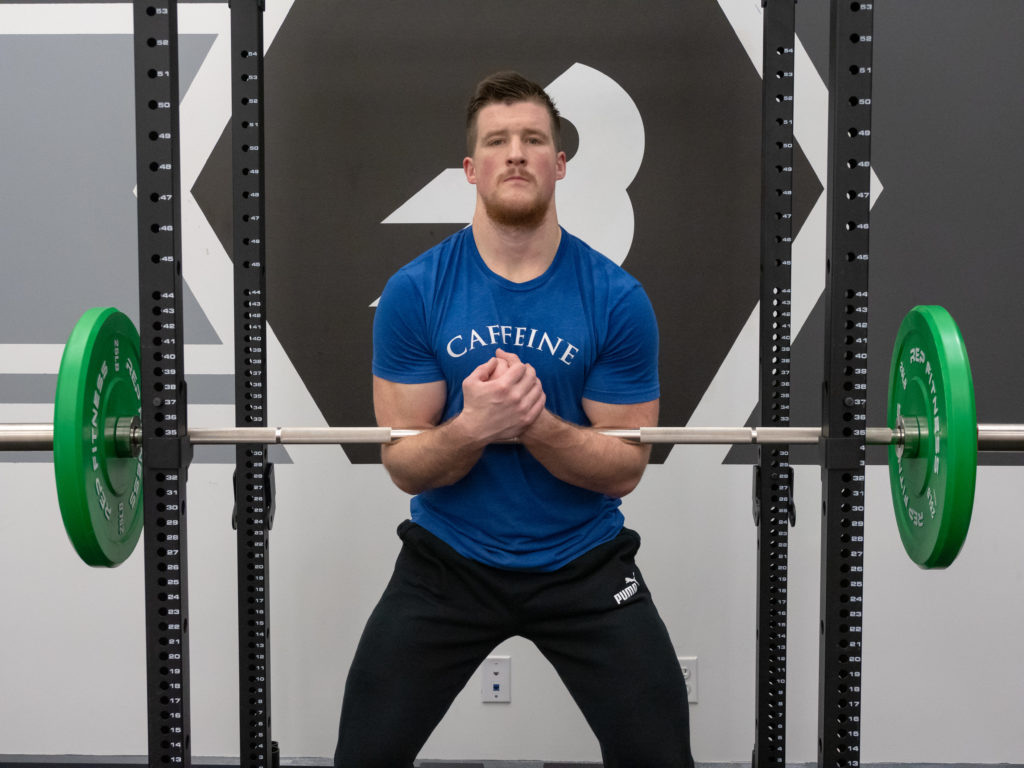 Zercher Squat Übungsanleitung - Stangenpositionierung