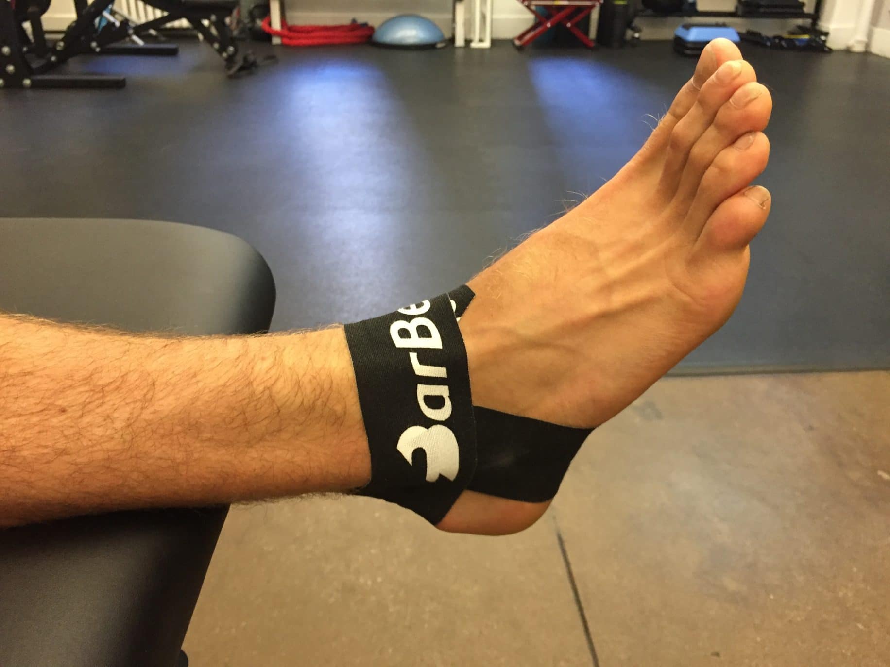 bureau dynasti kravle Kinesiology Taping for Ankle Stability and Sprain | BarBend