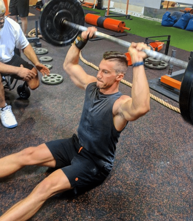 Z Press vs Overhead Press Which Is Best for Strength and Sport? BarBend