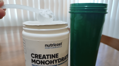 A scoop of Nutricost Creatine Monohydrate.