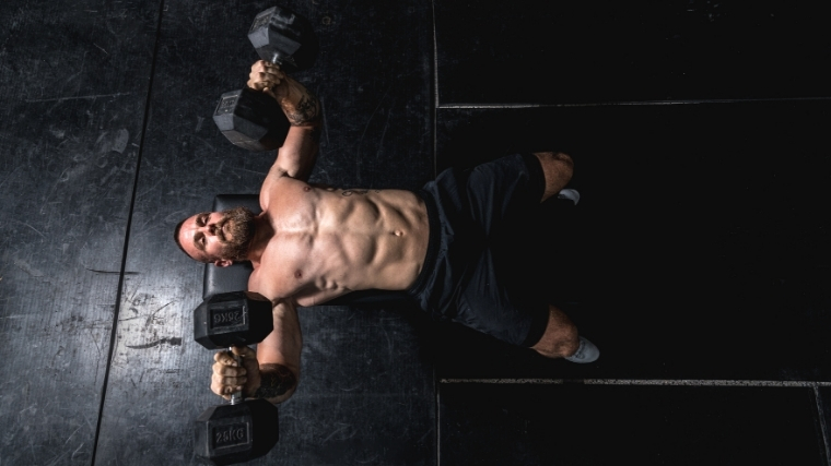 Man doing dumbbell bench press