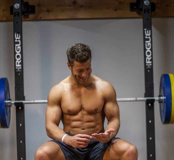 Jake Boly sitting on bench