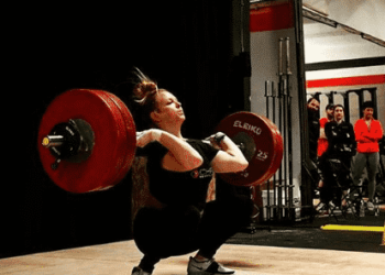 Weightlifter Sam Poeth executes a clean and jerk