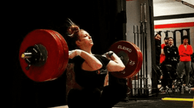 Weightlifter Sam Poeth executes a clean and jerk