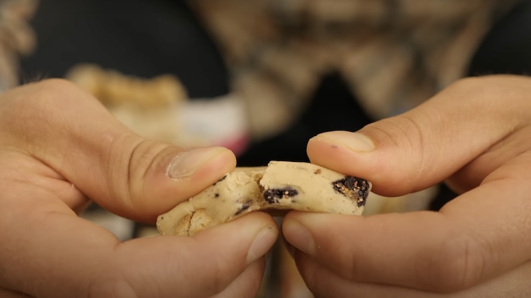 Our tester tearing open a Quest Protein Bar.