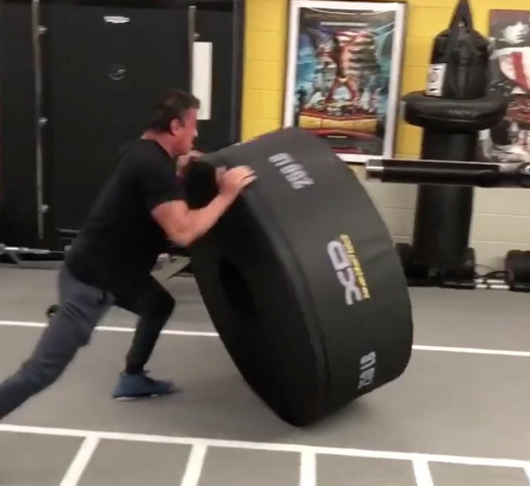Watch Sly Stallone Flip A 250lb Tire Training For Rambo 5 Barbend