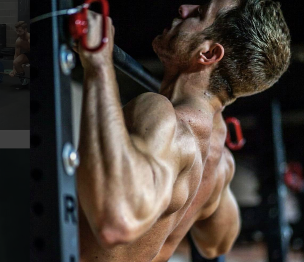 Image: Ryan at the Pull Up Station doing leg lift pull ups