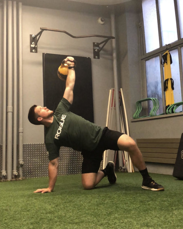 Turkish Get Up Exercise Guide BarBend