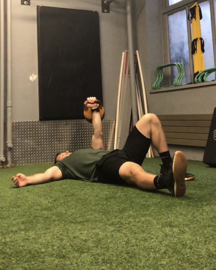 Turkish Get Up Exercise Guide BarBend