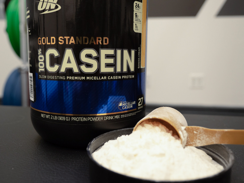 Optimum Nutrition Casein with scoop