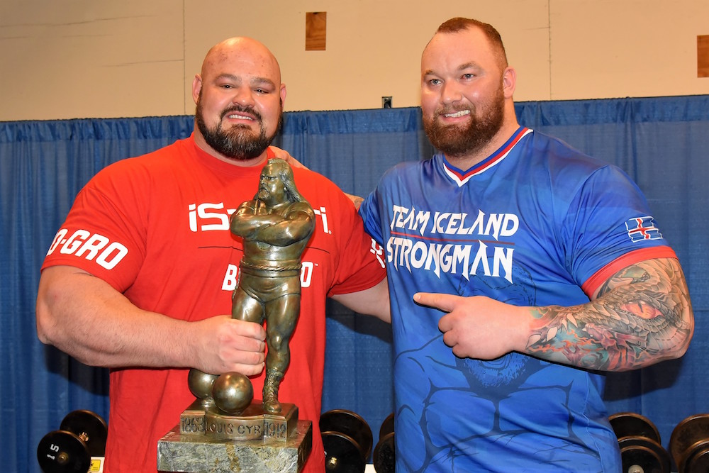 Strongman competitors and trophy