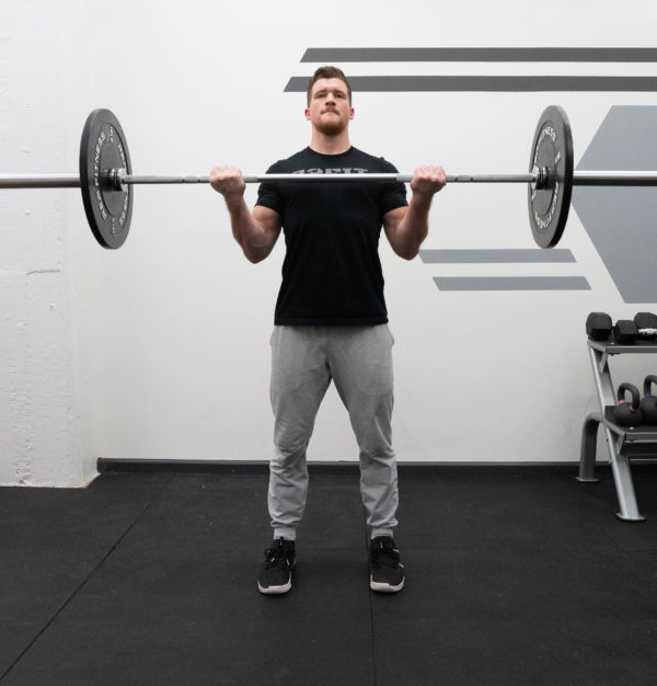 Barbell Curl Exercise Guide - Squeeze at the Top