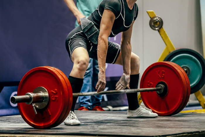 woman deadlifting