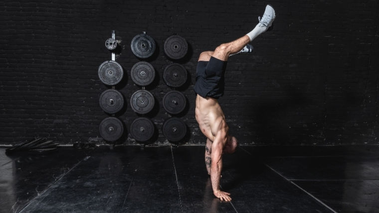 man doing handstand hold