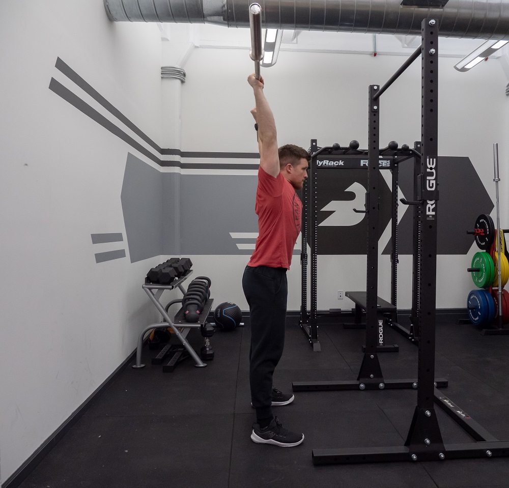 How to Overhead Press Properly Technique, Mistakes, and Variations