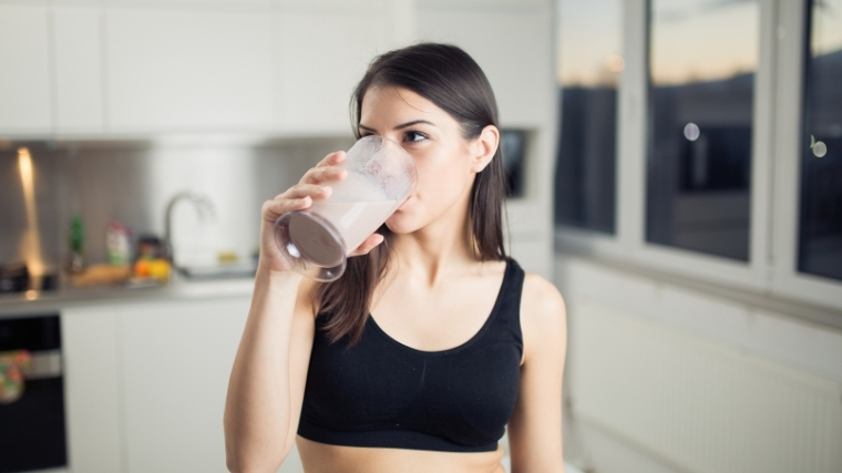 woman drinking shake