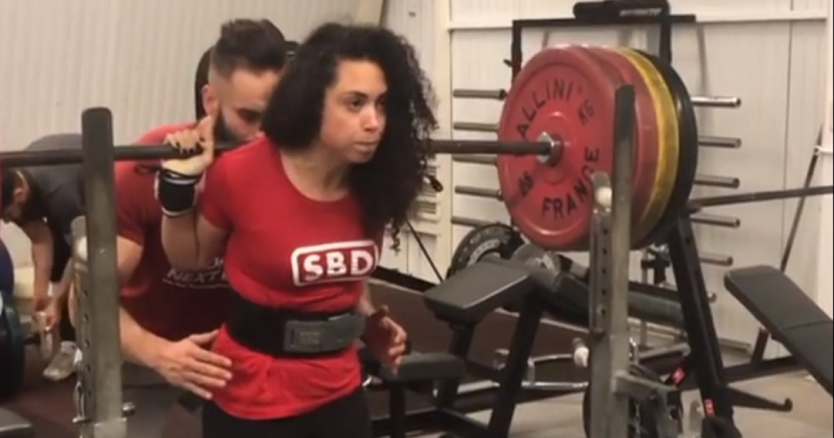 Watch Powerlifter Lya Bavoil Squat A Massive 440lbs | BarBend