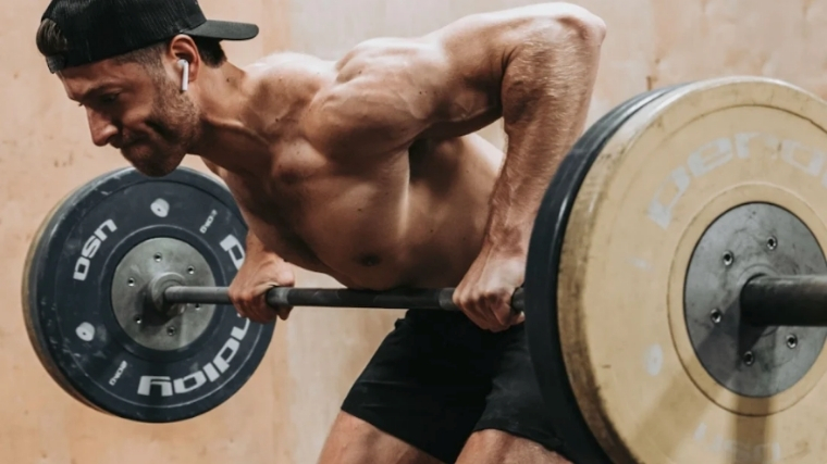 Man performing bent-over barbell row