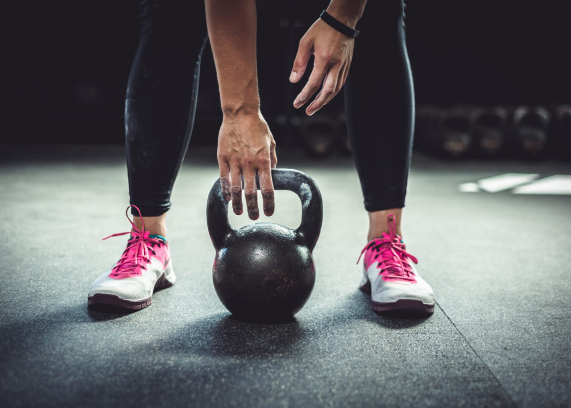 7 Ways to Build Stronger Shoulders With Kettlebells BarBend