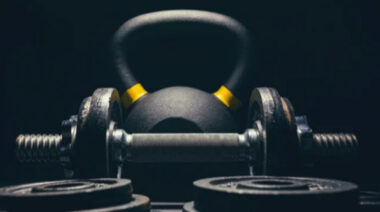 A Dumbbell in Front of a Kettlebell