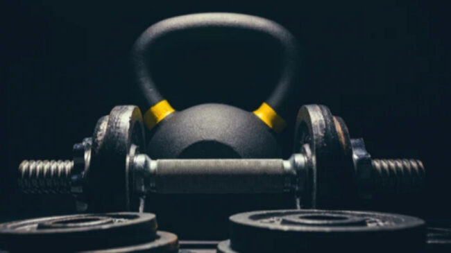 A Dumbbell in Front of a Kettlebell