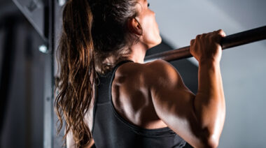 Woman performing pull-up