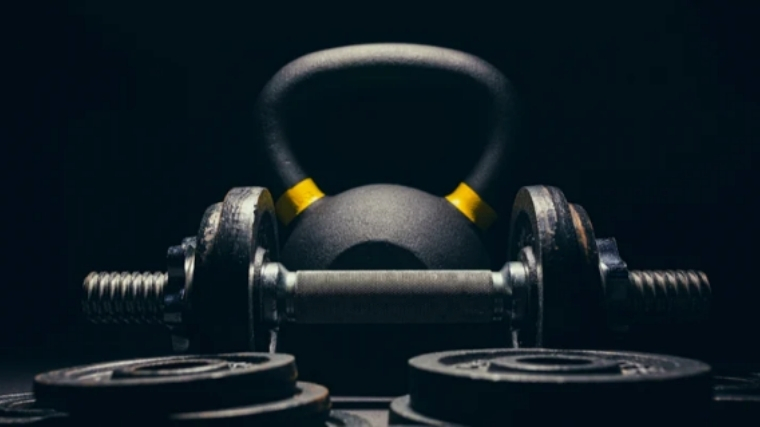 Dumbbells Vs. Kettlebells Choose the Right Tool for Your Goals