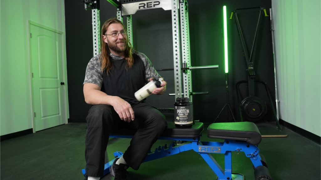 Our tester shakes up a serving of Onnit Whey Protein.