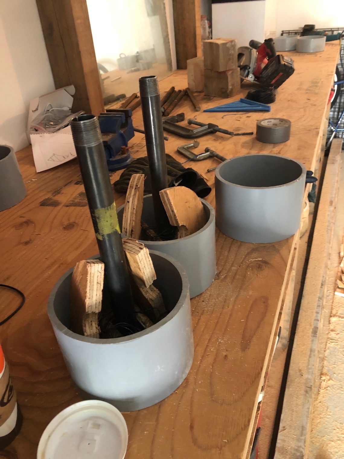 Desperate Times Called for Homemade Concrete Dumbbells BarBend