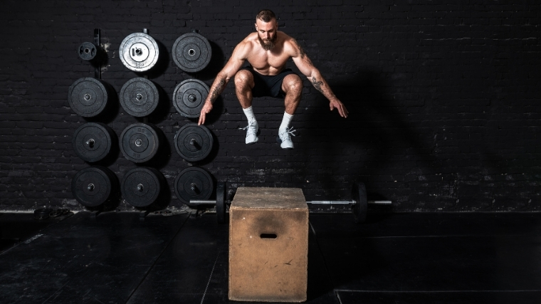 man performing box jump