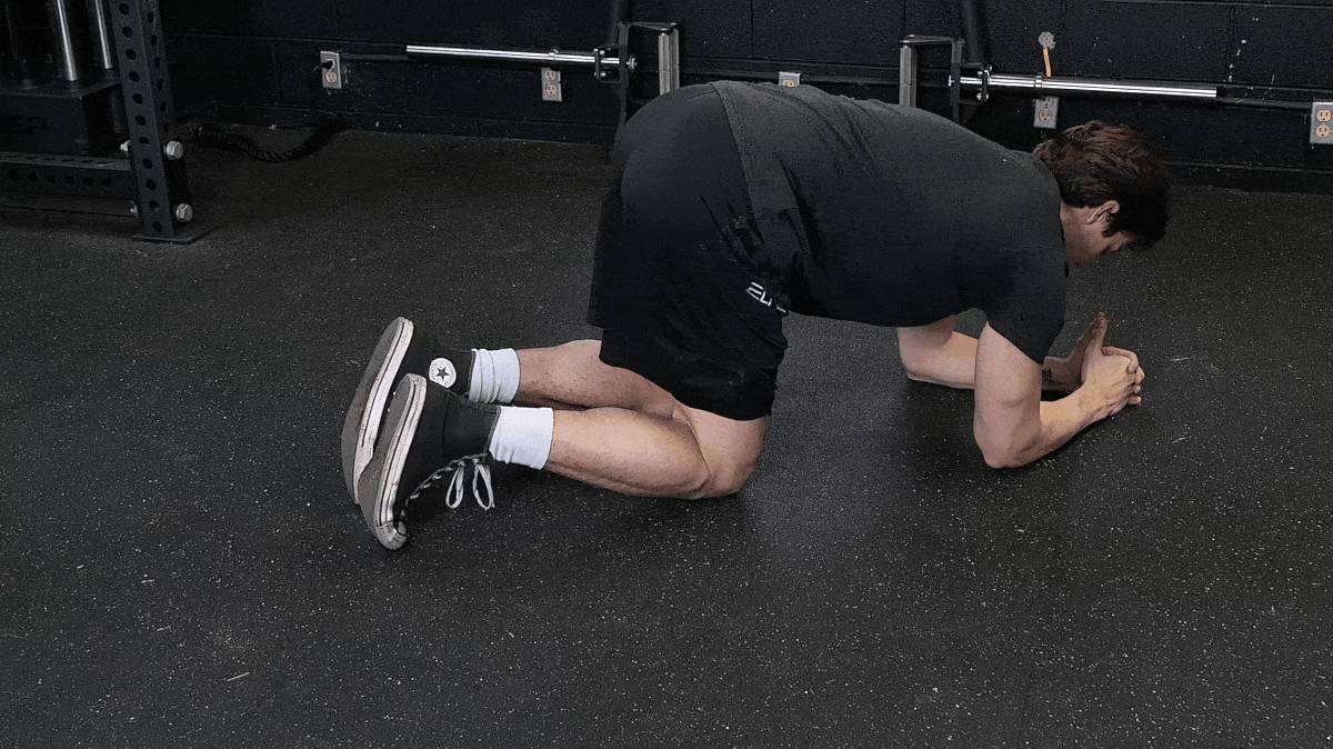 A person performing the rkc plank exercise.