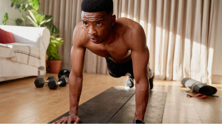 man performing ab workout at home