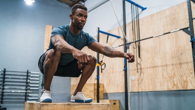 man performing box jump