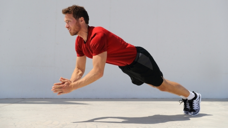 Man doing clapping push-up