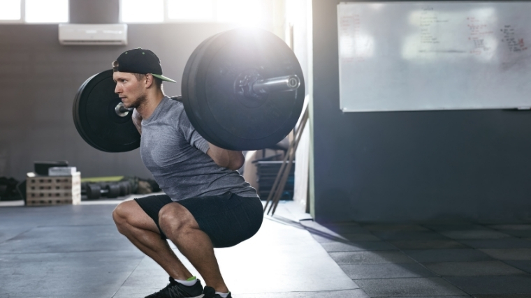 Man doing back squat