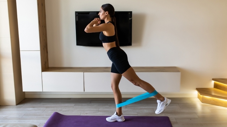 Woman using mini looped band