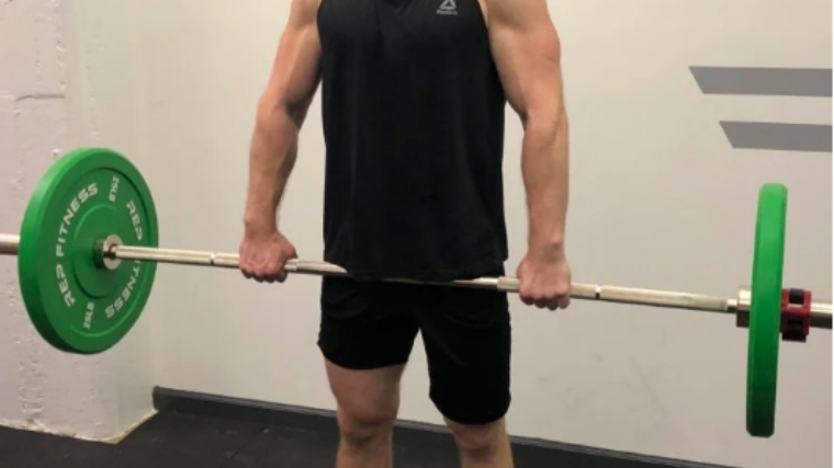 overhead barbell shrug