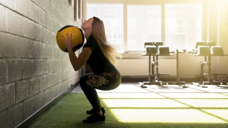 Woman doing wall balls