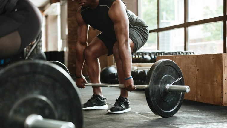 Man deadlifting