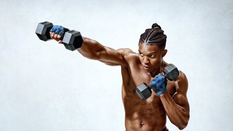 Man doing dumbbell punches