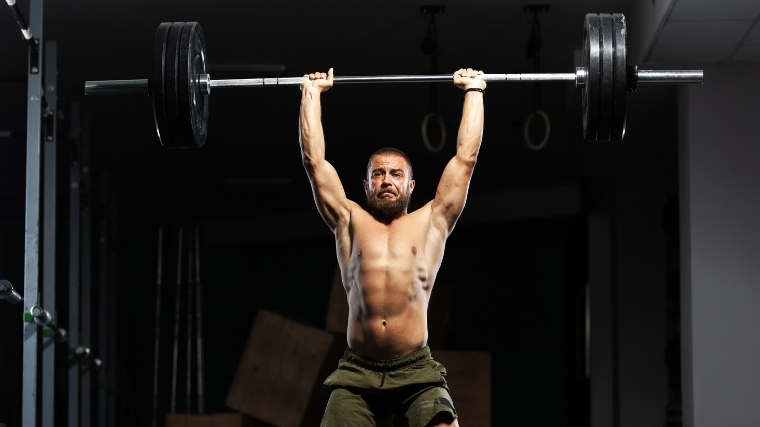 Man performing overhead press