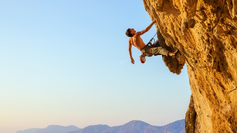 Man rock climbing